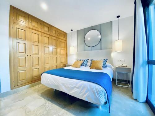 Foto de una habitación de Hotel Apartamentos Marina Luz
