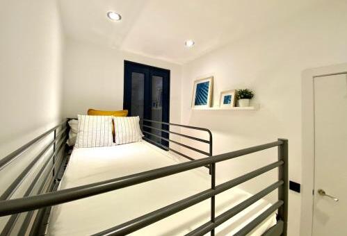 Foto de una habitación de Apartamentos AmazINN Places Atocha