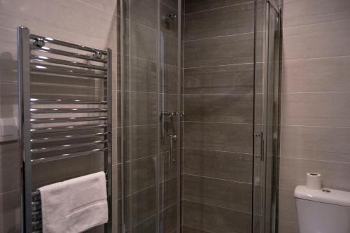 Foto del baño de Tres Puentes Anguiano Apartamentos &amp;amp; Habitaciones