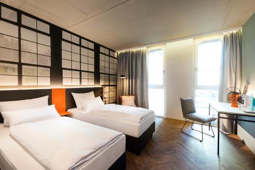 Foto de una habitación de LOGINN Hotel Waiblingen