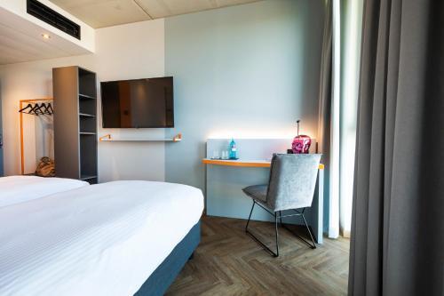 Foto de una habitación de LOGINN Hotel Waiblingen