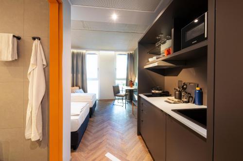 Foto de una habitación de LOGINN Hotel Waiblingen
