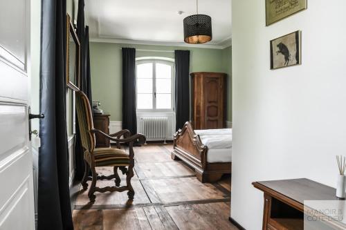 Foto de una habitación de Hostal Manoir de la Côte-Dieu