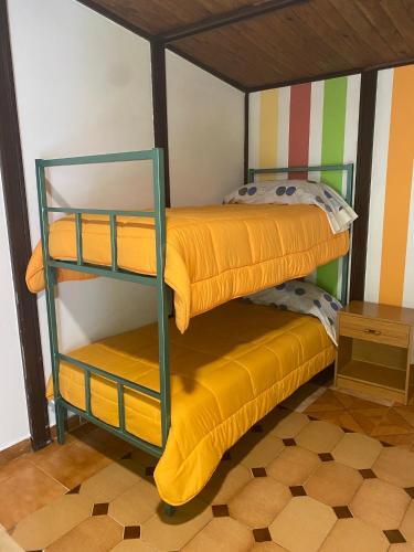Foto de una habitación de Albergue La HERMIDA
