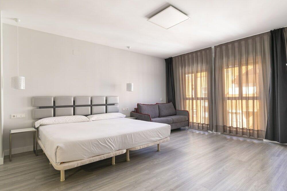 Foto de una habitación de HA Apartahotel Quo Eraso