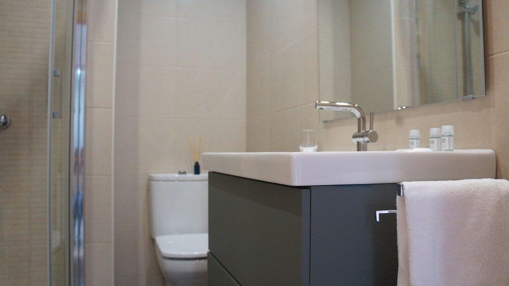 Foto del baño de Apartamentos Calma Rentals