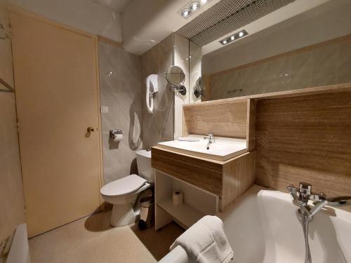 Foto del baño de Hôtel-Résidence Le Lys