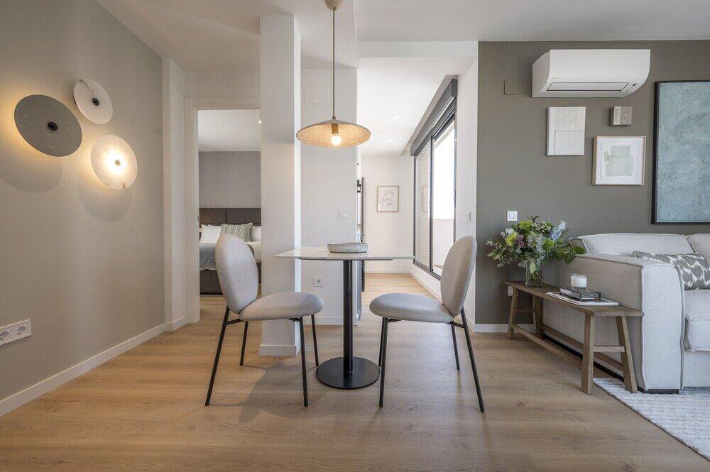 Foto de una habitación de Apartamentos MIOSOTIS SUITES