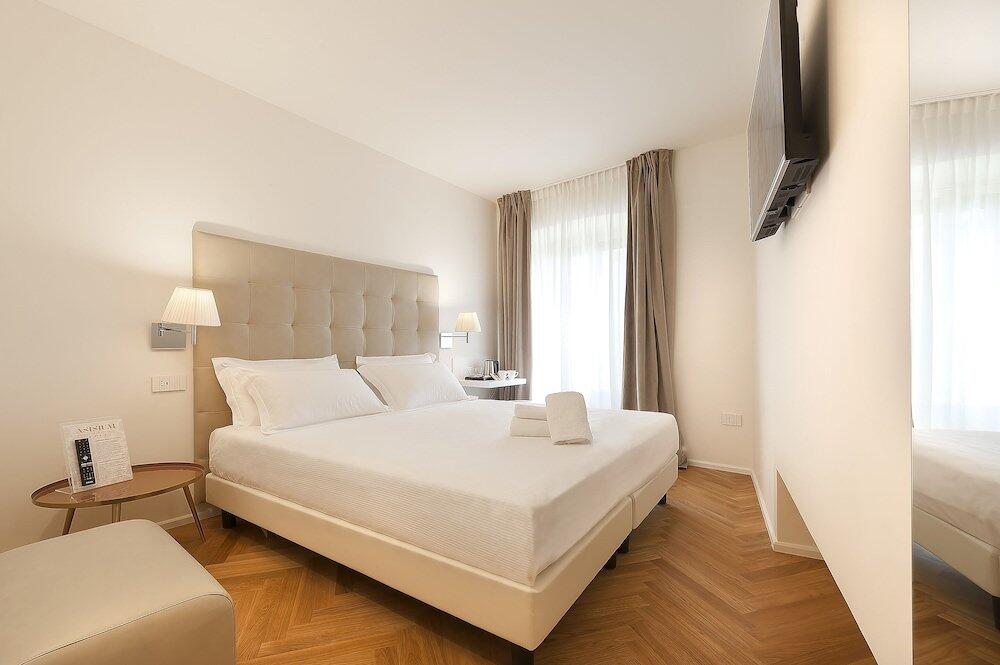 Foto de una habitación de Asisium Boutique Hotel