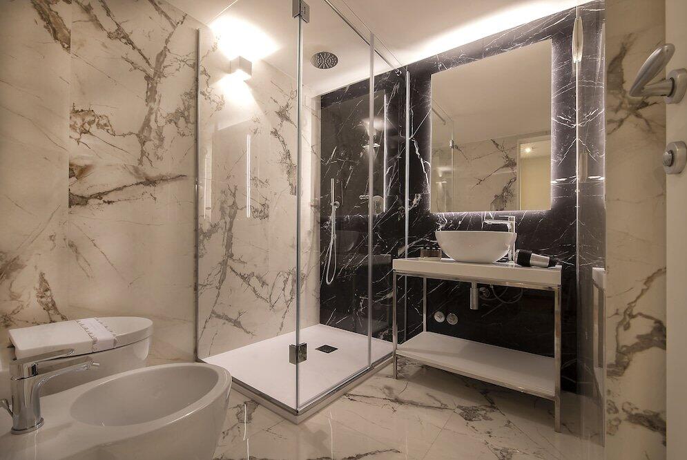 Foto del baño de Asisium Boutique Hotel
