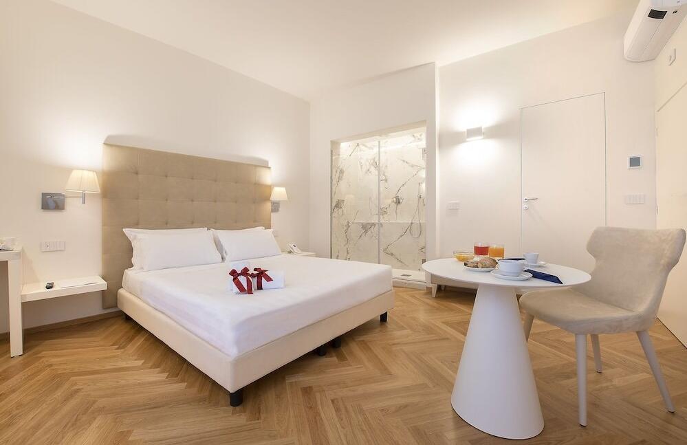Foto de una habitación de Asisium Boutique Hotel