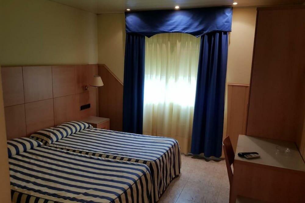 Foto de una habitación de Hostal Milenium