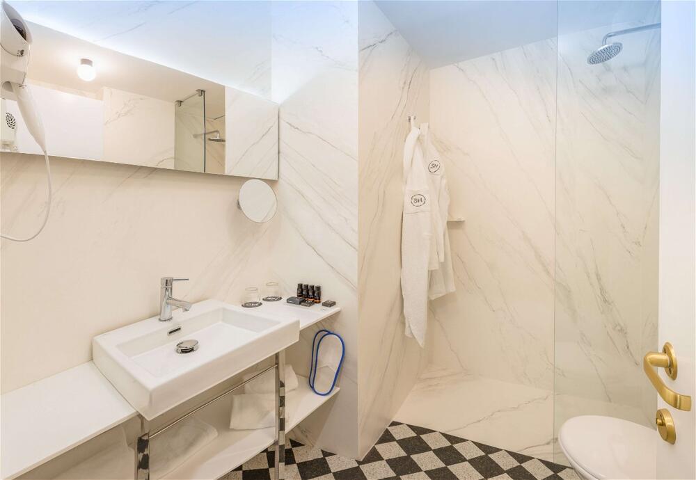 Foto de una habitación de SH Ingles Boutique Hotel