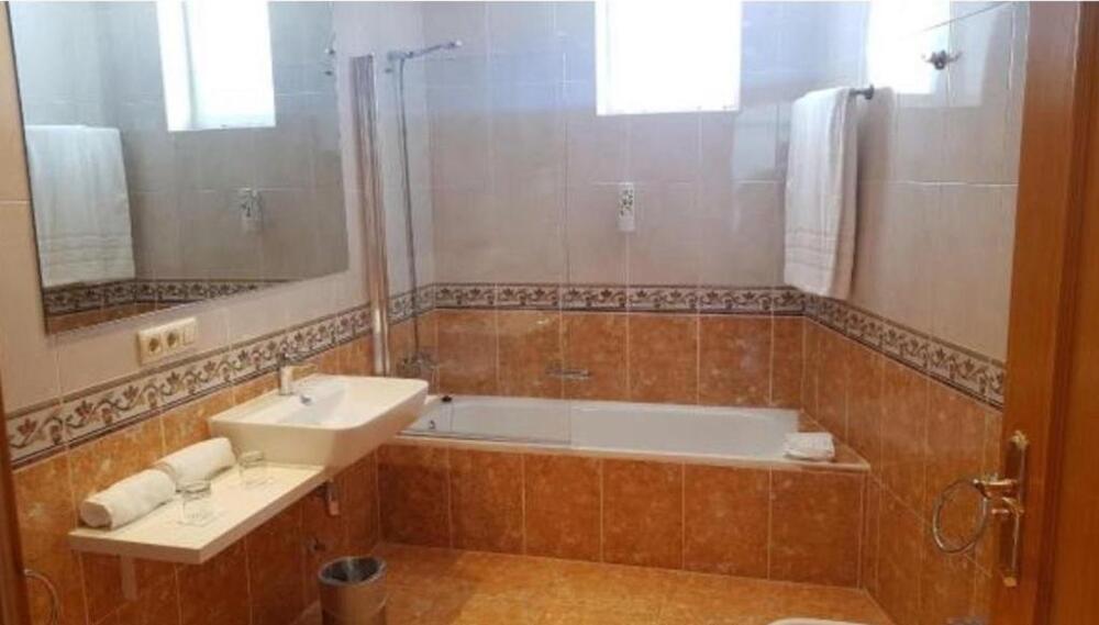 Foto del baño de Hotel Gara Suites Golf &amp;amp; Spa