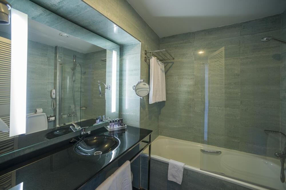 Foto del baño de Hotel Vila Gale Ampalius