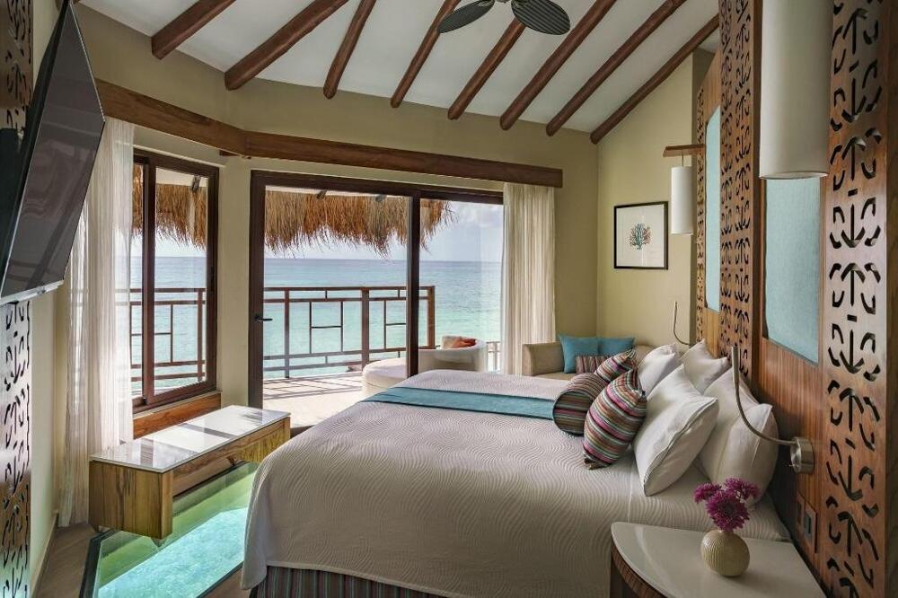 Foto de una habitación de Palafitos Overwater Bungalows El Dorado Maroma - Adults Only