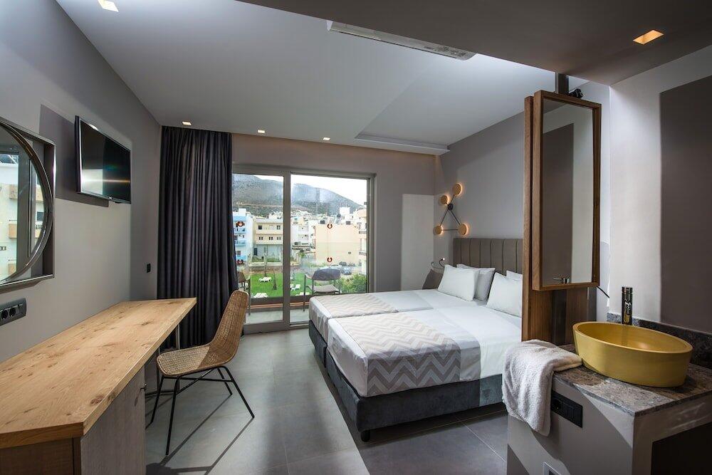 Foto de una habitación de Palmera Beach Hotel &amp;amp; Spa - Adults Only