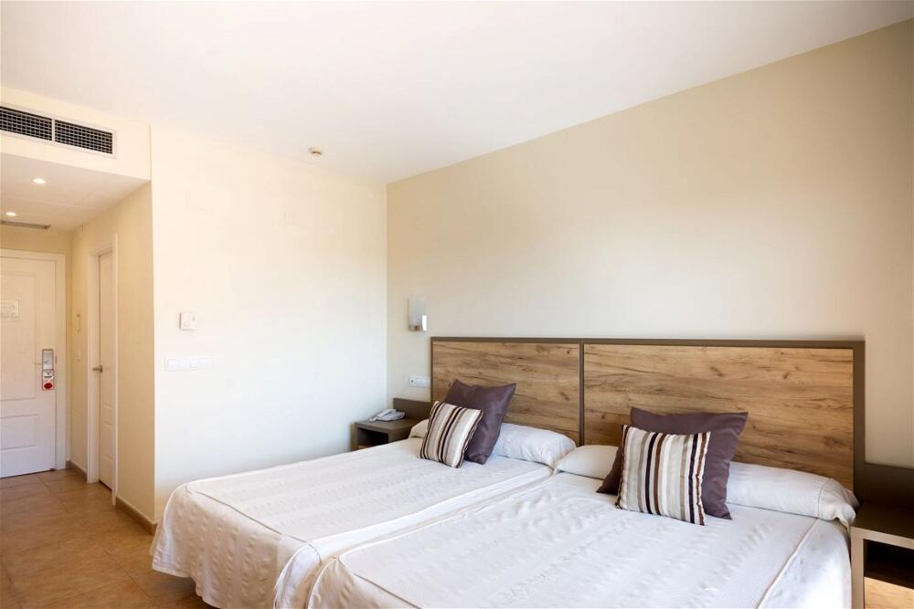 Foto de una habitación de Hotel Ohtels La Hacienda