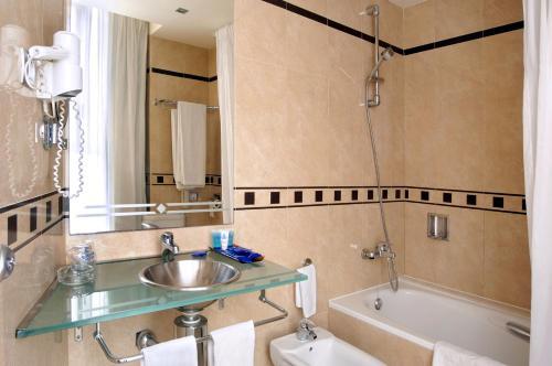 Foto del baño de Hotel Evenia Rocafort