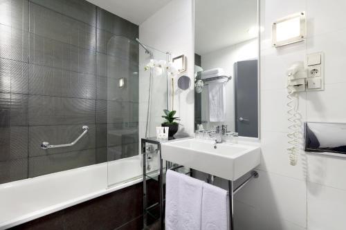 Foto del baño de Hotel Exe Tres Cantos