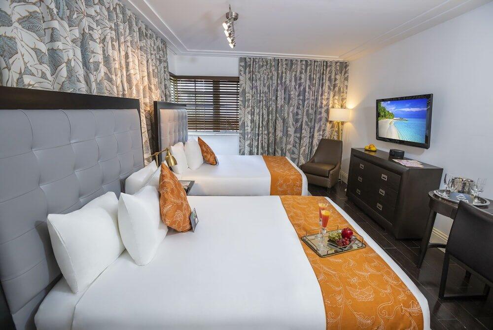 Foto de una habitación de Hotel Riviera Suites