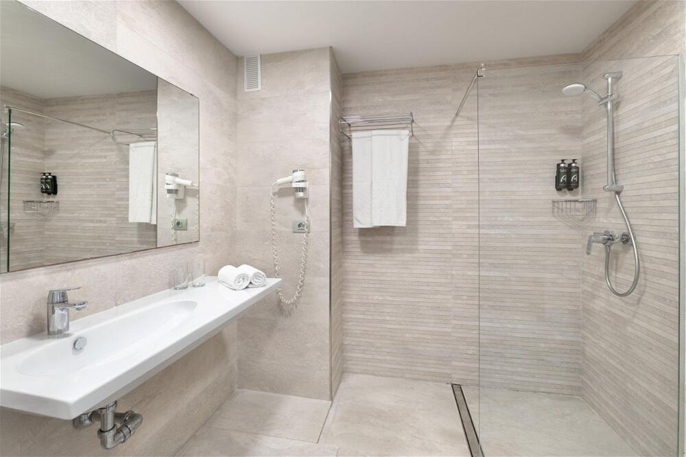 Foto del baño de Alexandre Hotel Troya