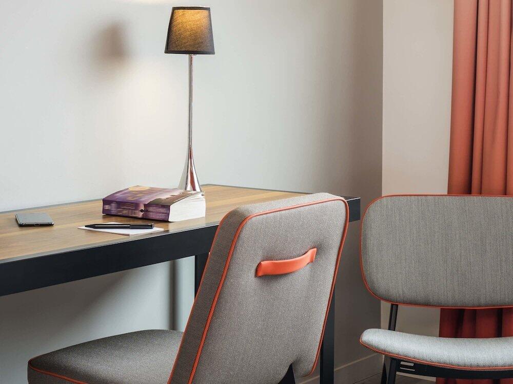 Foto de una habitación de Aparthotel Adagio Paris 19ème Cité de la Musique
