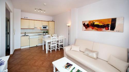 Foto de una habitación de Apartamentos Leo Canela