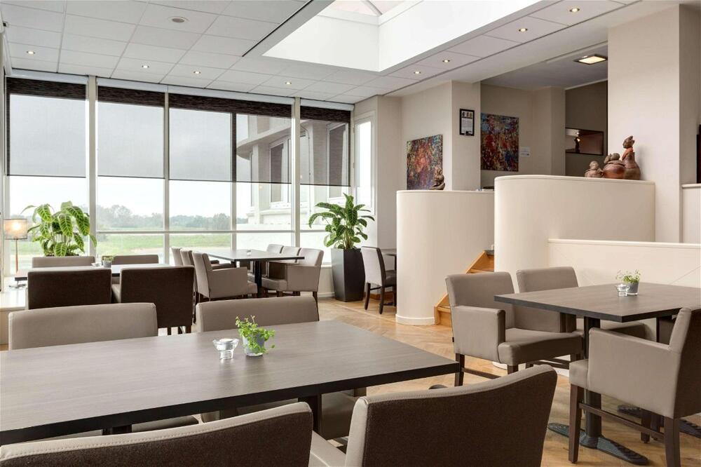 Foto de restauración de NH Arnhem Rijnhotel