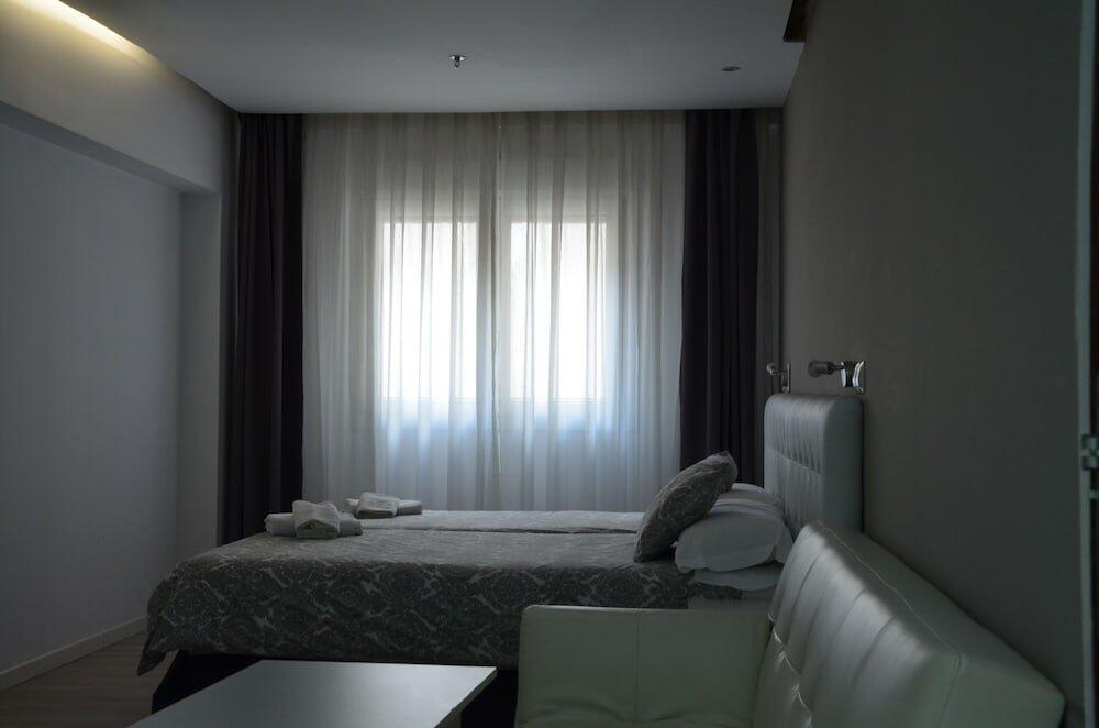 Foto de una habitación de Aparthotel Boutique Urban Madrid Genova
