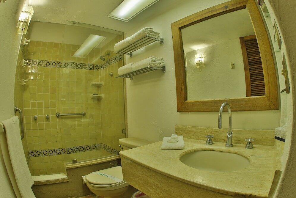 Foto del baño de Villas El Rancho Green Resort