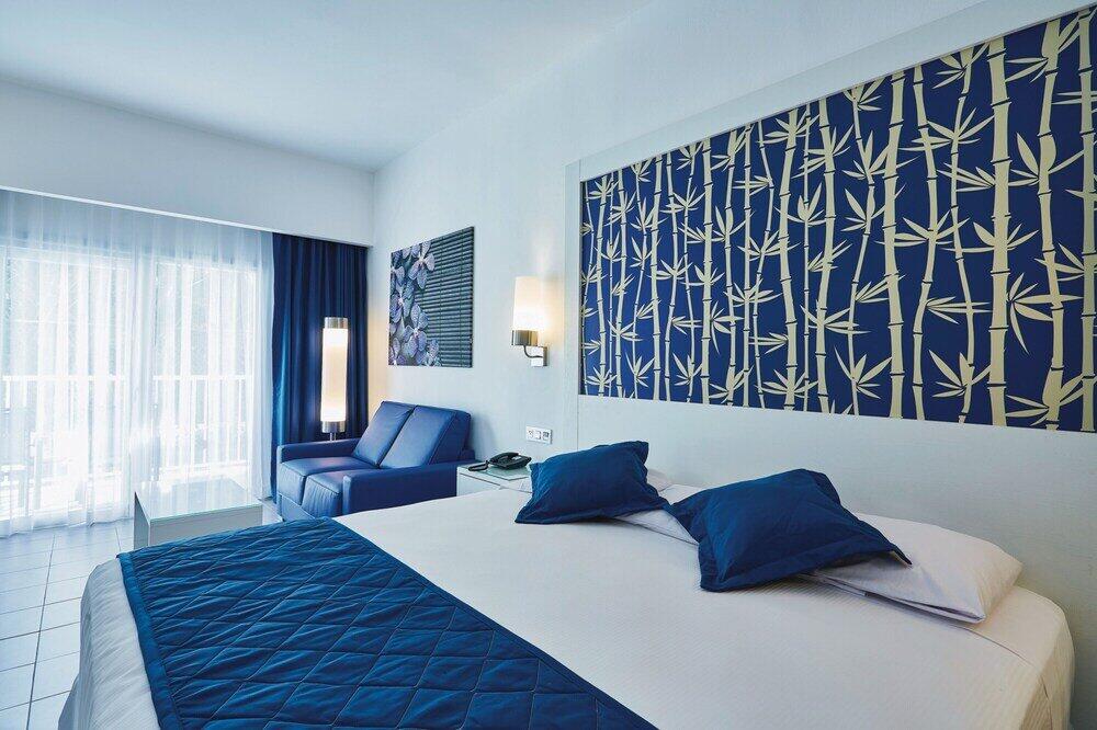 Foto de una habitación de Hotel Riu Bambu - All Inclusive