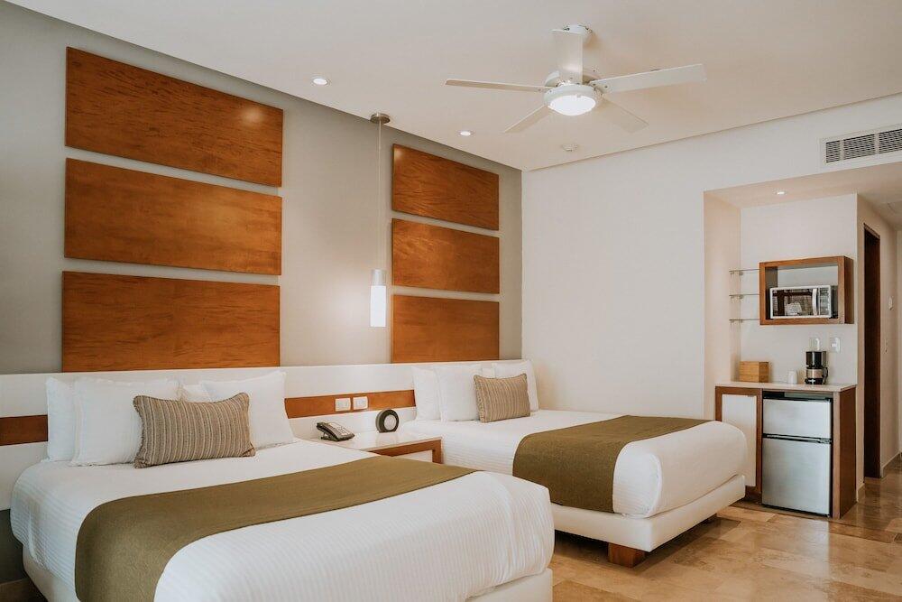 Foto de una habitación de Hotel The Reef 28 - Adults Only - All Suites - Optional All Inclusive