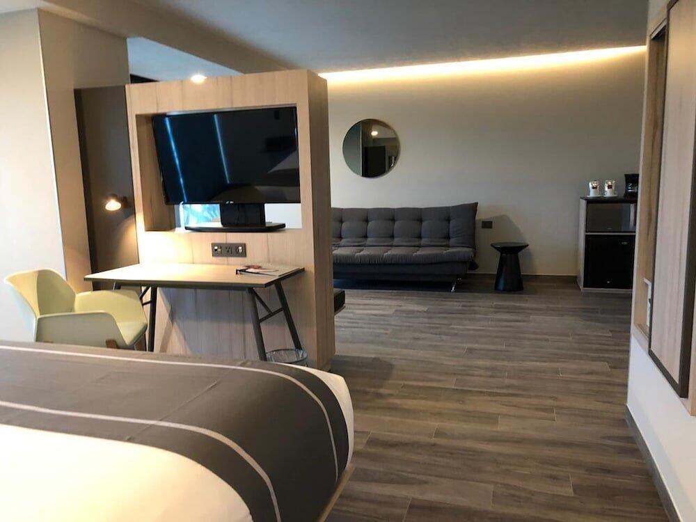 Foto de una habitación de Hotel City Express Plus Merida