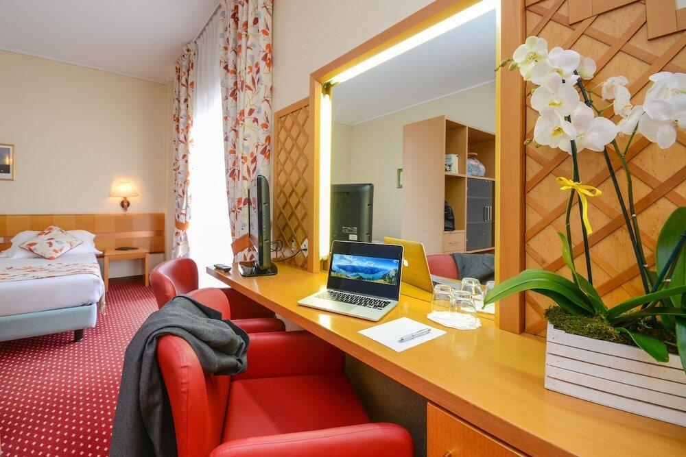 Foto de una habitación de Hotel Oliveto