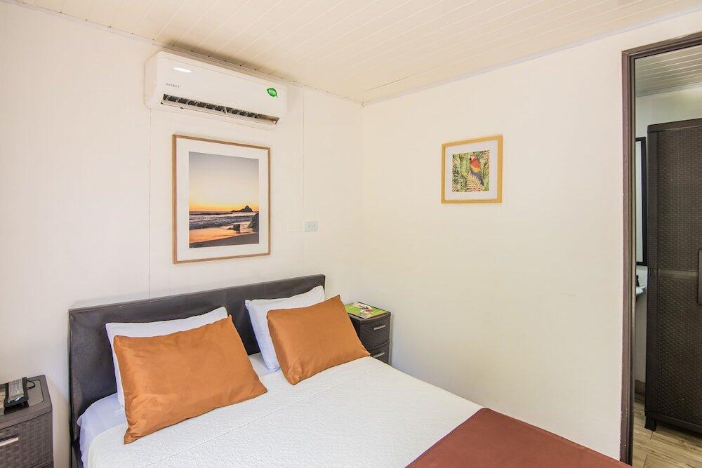 Foto de una habitación de Jaco Lodge Quiet Hotel