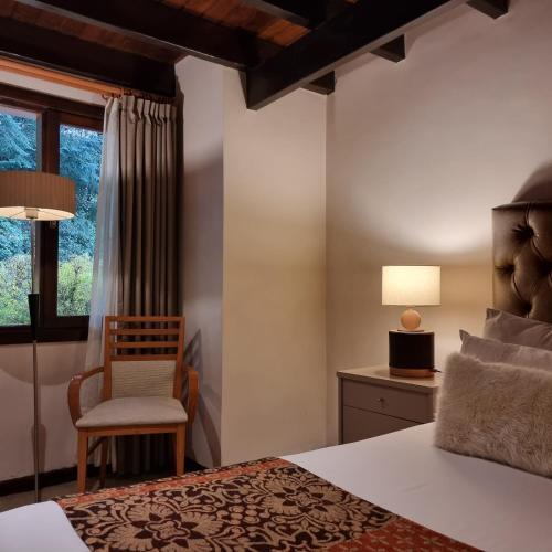 Foto de una habitación de Hotel Altos Los Pioneros &amp;amp; Spa
