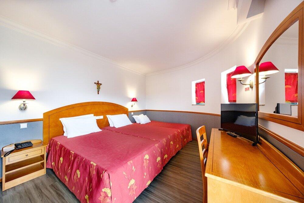 Foto de una habitación de Hotel Santo Amaro