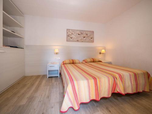 Foto de una habitación de Complejo Ciudad De Vacaciones Cala Montjoi