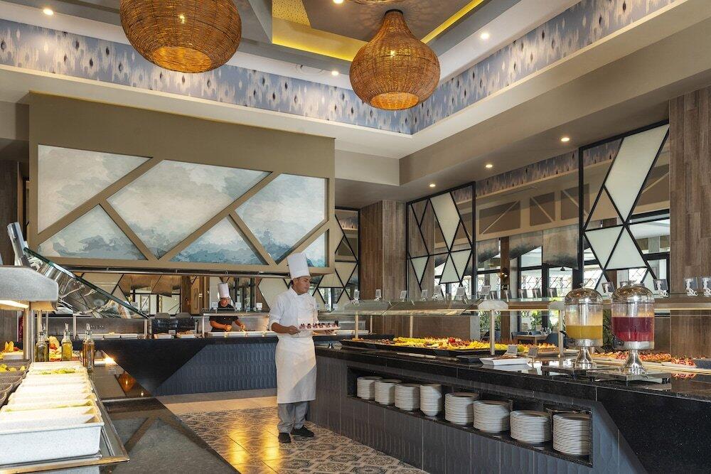 Foto de restauración de Aparthotel Riu Caribe - All Inclusive