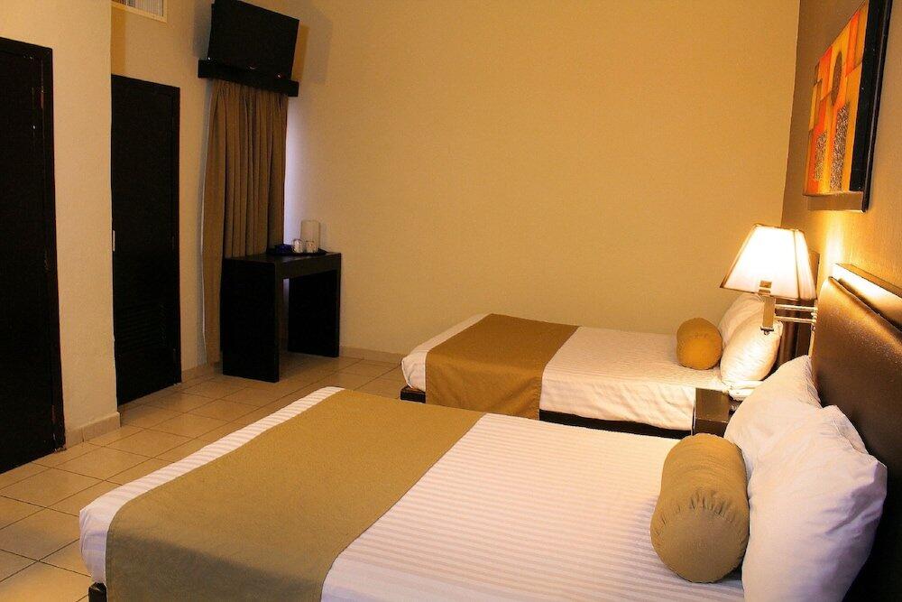 Foto de una habitación de Hotel La Siesta