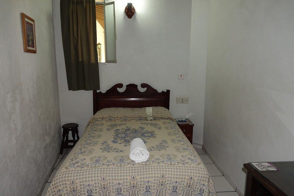Foto de una habitación de Hotel La Merced