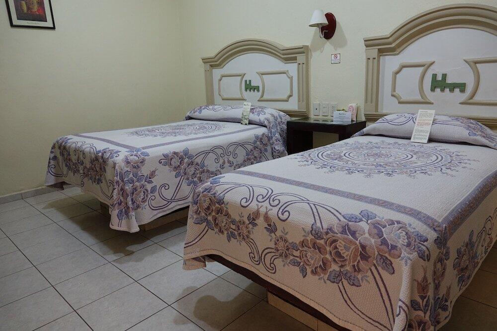 Foto de una habitación de Hotel La Merced
