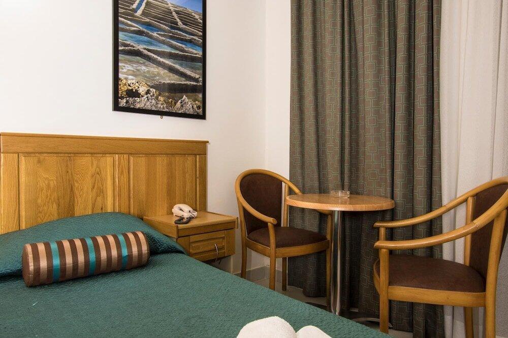 Foto de una habitación de Canifor Hotel