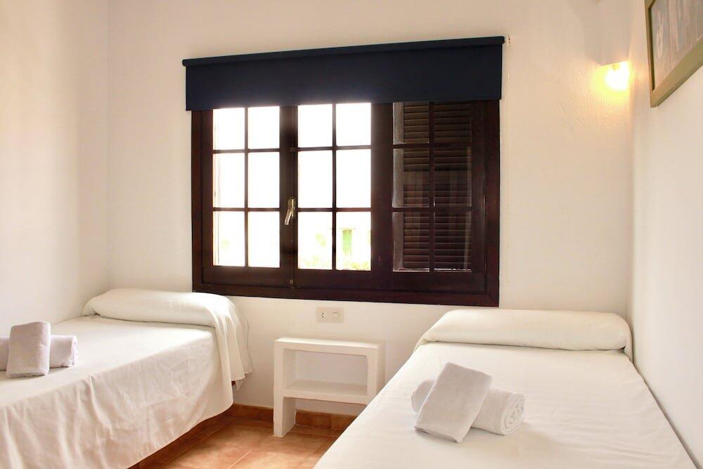 Foto de una habitación de Apartamentos Posidonia