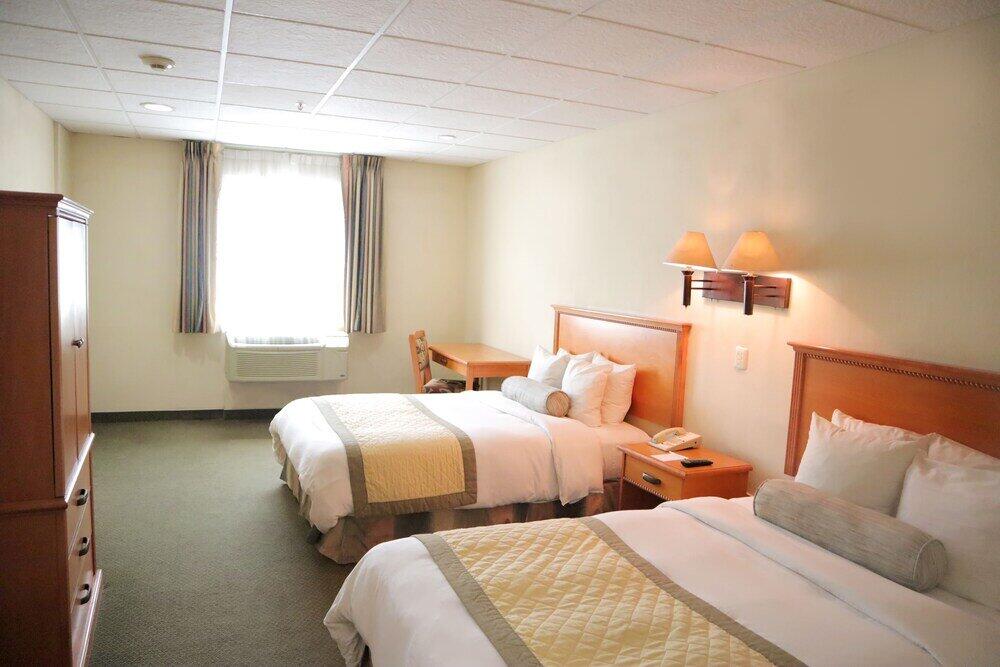Foto de una habitación de Hotel Antaris Galerías