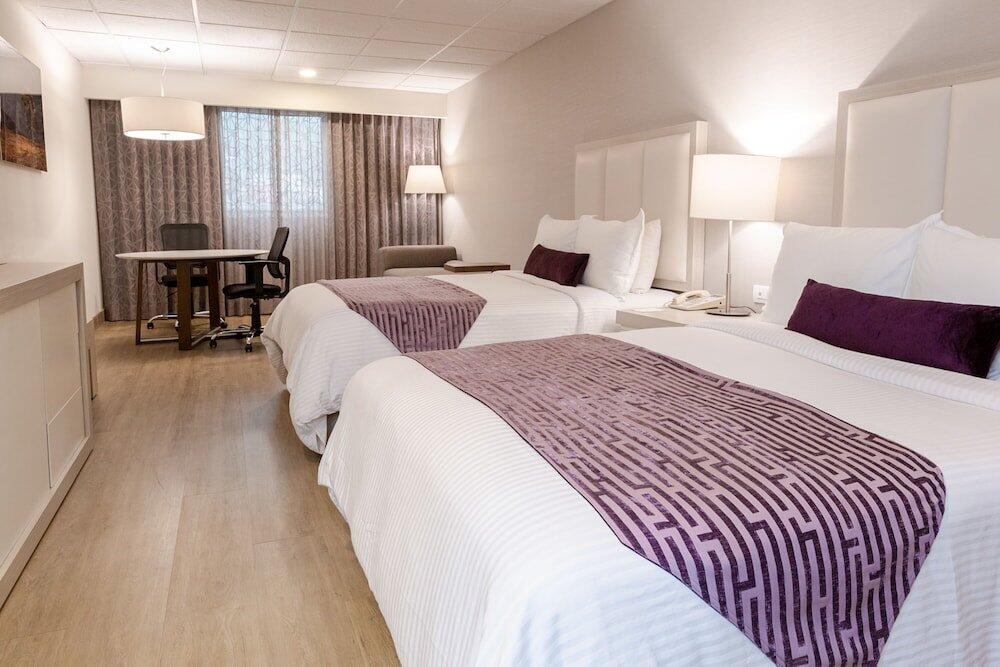 Foto de una habitación de Hotel Antaris Galerías