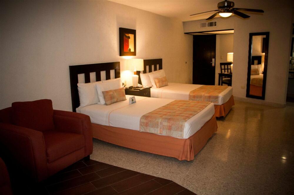 Foto de una habitación de Best Western Hotel Posada Freeman Zona Dorada