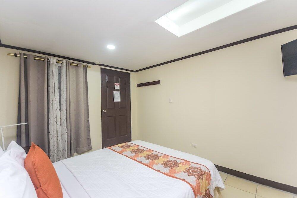Foto de una habitación de Hotel Berlor Airport Inn