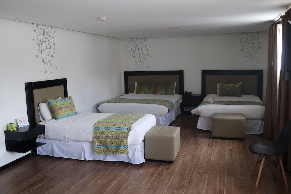 Foto de una habitación de Hotel Embassy Quito